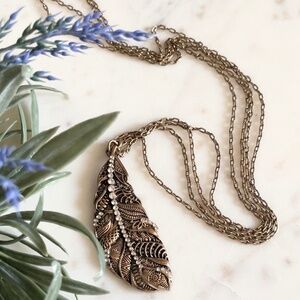 Long jeweled brass bohemian feather necklace